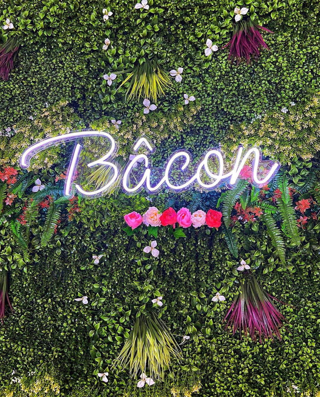 Branded floral green wall