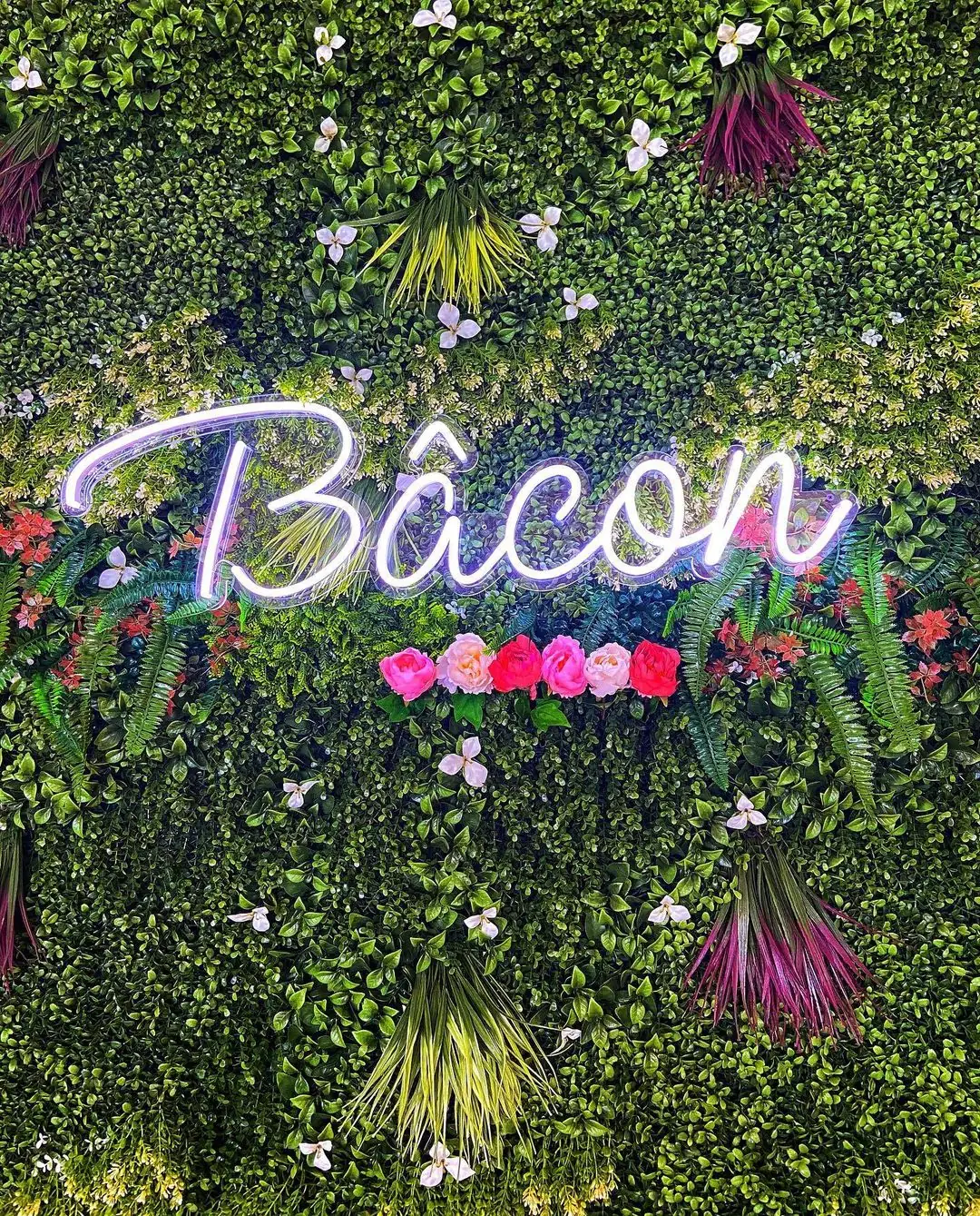 Branded floral green wall